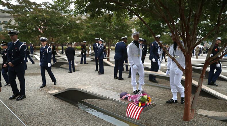 A Patriot Day ceremony by Cherokee County will begin at 8:30 a.m. Sept. 9 that can be attended in person or viewed online at facebook.com/CherokeeCountyGa. Members of the U.S. Military walk through a 911 memorial during a ceremony at the Pentagon to commemorate the anniversary of the 9/11 terror attacks September 11, 2019 in Arlington, Virginia. The nation was marking the 18th anniversary of the terror attacks that took almost 3000 lives in New York City, Pennsylvania and at the Pentagon.  (Photo by Mark Wilson/Getty Images)