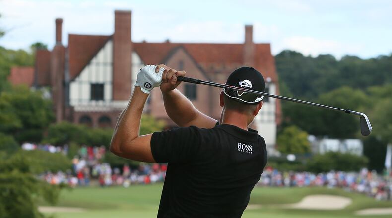 Henrik Stenson hits his fairway shot at last year’s Tour Championship at East Lake. (CURTIS COMPTON CCOMPTON@AJC.COM)