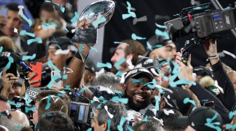 Brandon Graham, #55 of the Philadelphia Eagles, celebrates with the Vince Lombardi Trophy after his teams 41-33 win over the New England Patriots in Super Bowl LII at U.S. Bank Stadium on February 4, 2018 in Minneapolis, Minnesota.