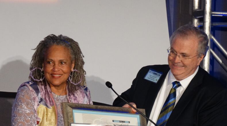Former UGA classmate and CNN president Tom Johnson presented the Atlanta Press Club Award to legend Charlagne Hunter-Gault. CREDIT: Rodney Ho/ rho@ajc.com