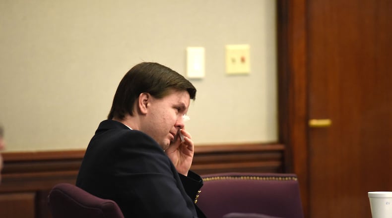 Ross Harris wipes his face with a tissue during closing arguments in his murder trial this week.