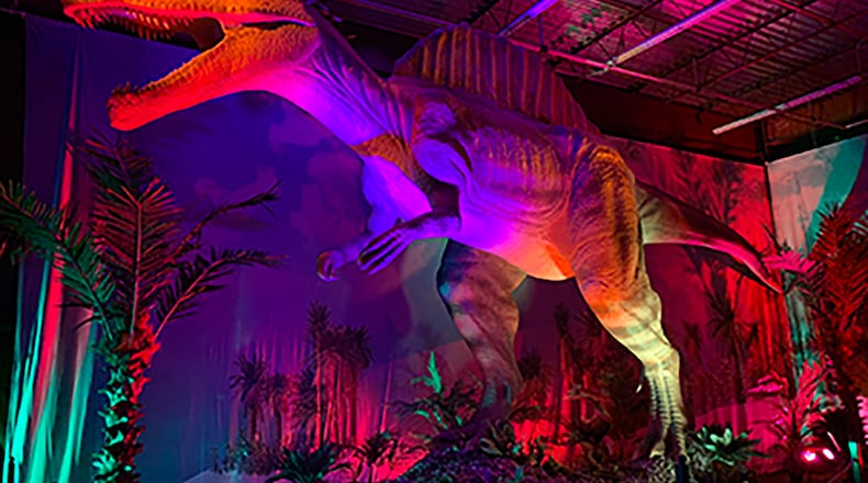 The Spinosaurus at the Dino Safari exhibit at North Point Mall in Alpharetta through April, 2022. RODNEY HO/rho@ajc.com