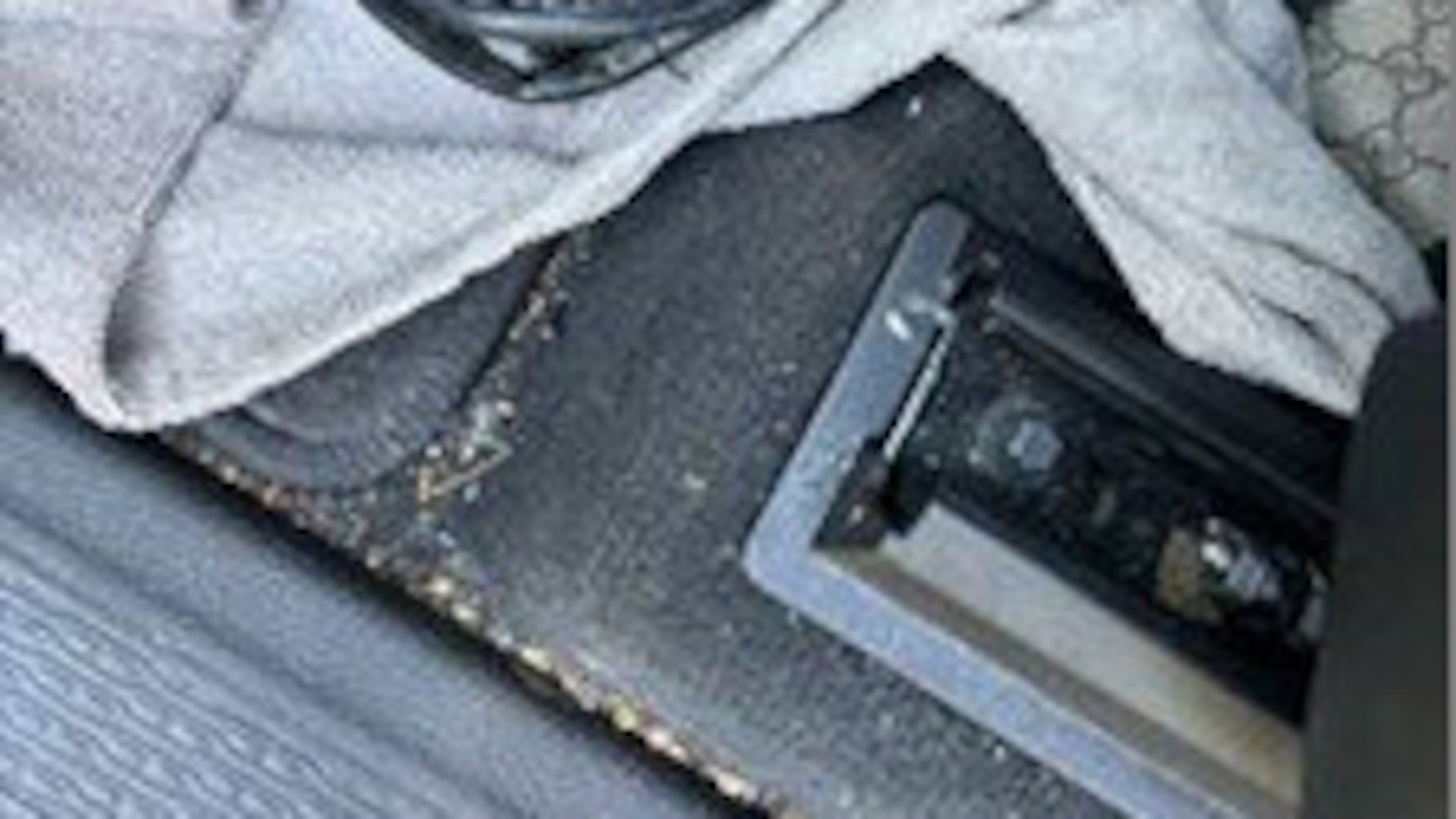 This photo provided by the U.S. Immigration and Customs Enforcement shows a loaded handgun found in the vehicle of Des Moines Public Schools Superintendent Ian Roberts on Friday, Sept. 26, 2025. (ICE via AP)