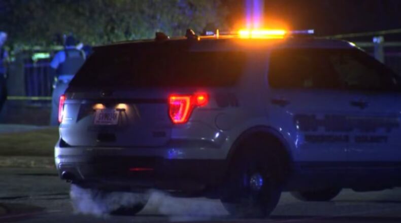 The GBI is investigating after gunfire was exchanged between the Georgia State Patrol and a suspect at a gas station in Rockdale County, officials said.