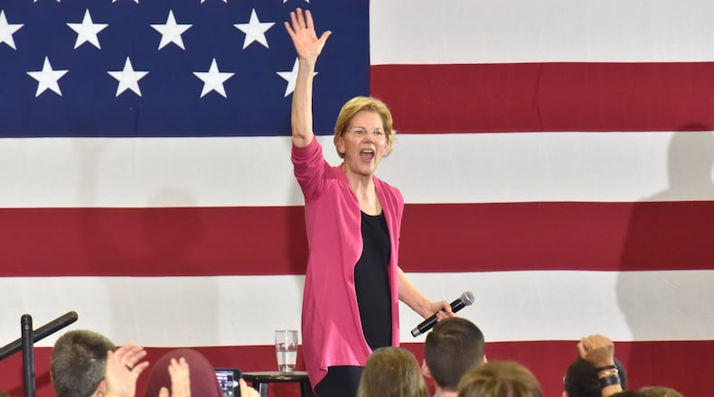 Democratic presidential candidate Elizabeth Warren waves to supporters during an "organizing event"  at Central Gwinnett High School on Saturday, February 16, 2019, to rally supporters behind her bid for the White House. (Photo: HYOSUB SHIN / HSHIN@AJC.COM)