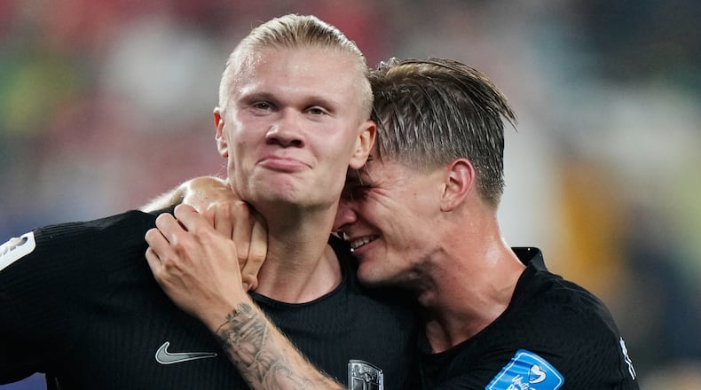Norway's Erling Haaland, left, celebrates with David Moeller Wolfe after scoring their third goal during the World Cup Group I soccer match between Norway and Senegal in East Rutherford, N.J., near New York, Monday, June 22, 2026. (AP Photo/Steve Luciano)