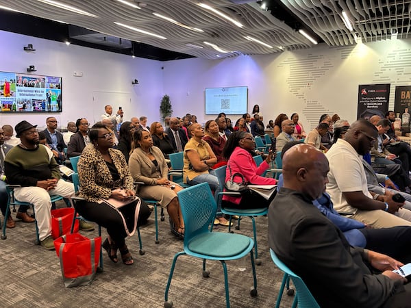 Attendees listen Saturday at Mayday, Agate Solutions' event at the Russell Innovation Center for Entrepreneurs in Atlanta. (Allison Mawn/AJC)