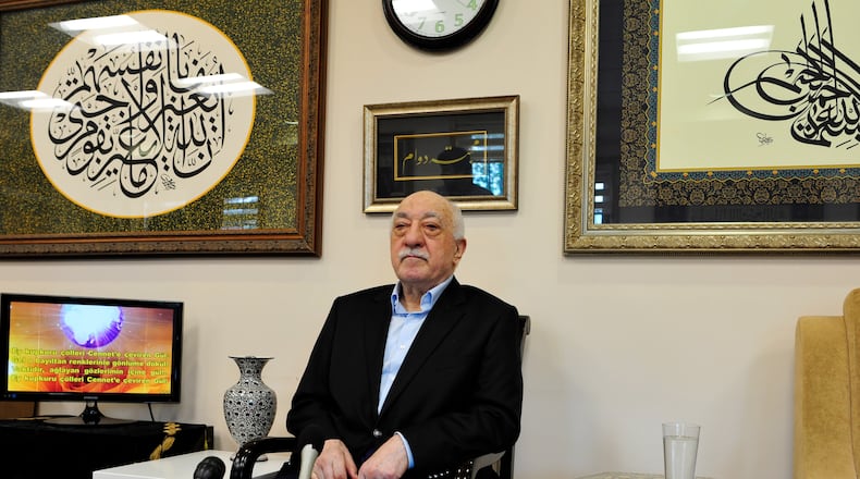 Islamic cleric Fethullah Gulen speaks to members of the media at his compound, Sunday, July 17, 2016, in Saylorsburg, Pa. Turkish officials have blamed a failed coup attempt on Gulen, who denies the accusation. (AP Photo/Chris Post)