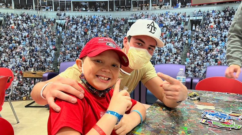Georgia Tech tight end Dylan Leonard, right, with friend Brentley Russell at Children's Scottish Rite Hospital in Atlanta. (Photo courtesy of Ashley Chastain).