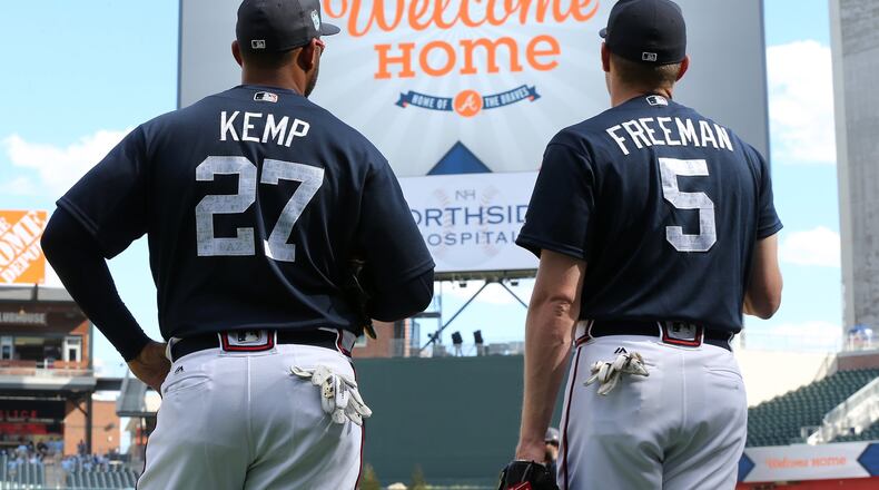 The Braves’ Matt Kemp and Freddie Freeman take in their new home before Friday night’s exhibition game against the New York Yankees at SunTrust Park. (Curtis Compton/ccompton@ajc.com)