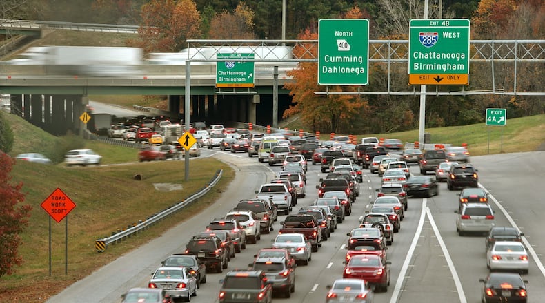 Nov. 14, 2012 - Atlanta, Ga: During rush hour, traffic backs up on GA 400 going north toward the interchange with I-285 on a Wednesday afternoon. The Ga. 400/I-285 interchange is the one project singled out by Gov. Nathan Deal as a transportation project priority. JASON GETZ / JGETZ@AJC.COM