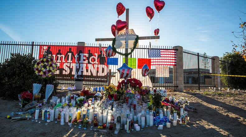 A makeshift memorial set up near the Inland Regional Center where 14 people were killed and 21 wounded in a mass shooting in San Bernardino, Calif., on Wednesday. The FBI is investigating the rampage “as an act of terrorism.” Jim Wilson/The New York Times