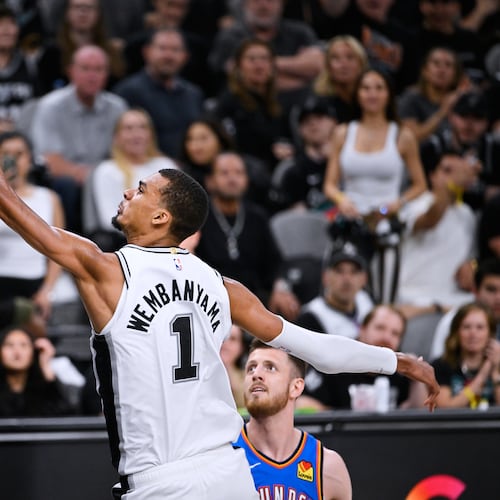 San Antonio Spurs forward Victor Wembanyama (1) scores a basket on the Oklahoma City Thunder during the second half of Game 4 in the Western Conference finals NBA basketball playoffs series in San Antonio, Sunday, May 24, 2026. (AP Photo/Darren Abate)