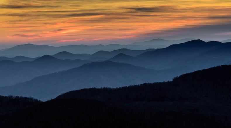 Layers of mountain ridges at sunrise taken from peaks of the Blue Ridge Mountains in Norh Carolina.