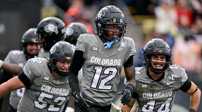 Colorado's Travis Hunter (12) celebrates after scoring a fourth-quarter touchdown against Utah at Folsom Field on Saturday, Nov. 16, 2024, in Boulder, Colorado. (Dustin Bradford / Getty Images / TNS)