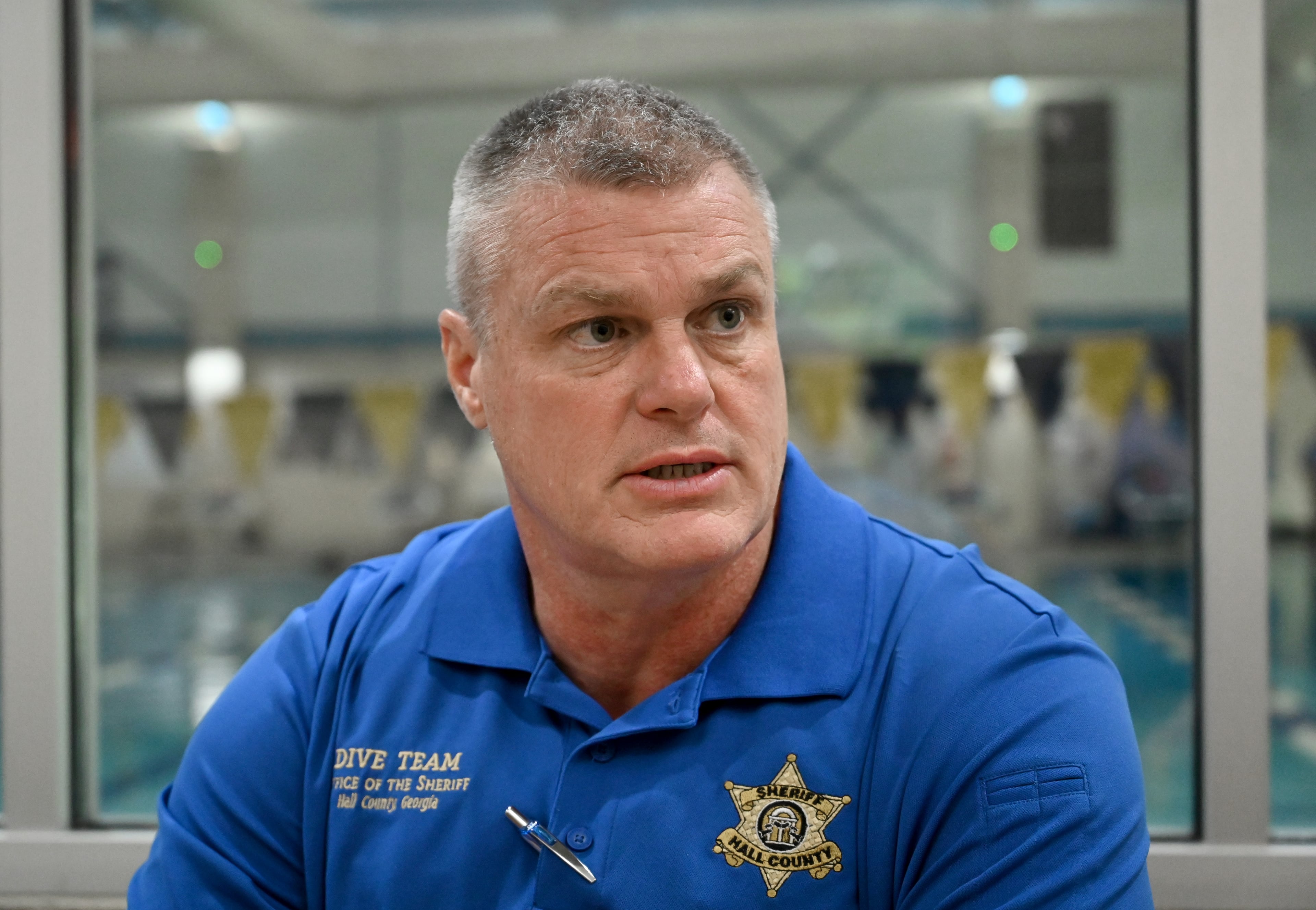 Lt. Chris Tempel has been working with the team for several decades. (Hyosub Shin / AJC)