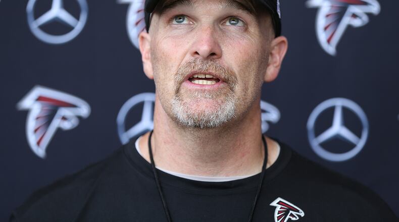 June 13, 2017, Flowery Branch: Falcons head coach Dan Quinn is looking up as he sums up the first day of mini-camp on Tuesday, June 13, 2017, in Flowery Branch. Curtis Compton/ccompton@ajc.com