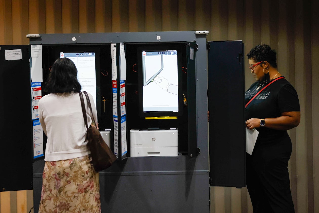 Fulton County resident Andrea Martinez (left) is seen casting her ballot inside the Antioch Baptist Church in Atlanta during Election Day on Tuesday, Nov. 5, 2024.
(Miguel Martinez/AJC)