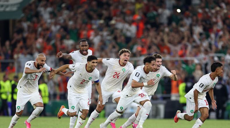 The Moroccan team starts to celebrate after winning on penalty kicks the World Cup round of 32 soccer match between the Netherlands and Morocco in Guadalupe, near Monterrey, Mexico, Monday, June 29, 2026. (AP Photo/Sofia Yaker)