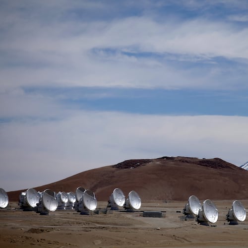 FILE - Radio antennas are spread out on the terrain as part of one of the world's largest astronomy projects, the Atacama Large Millimeter/submillimeter Array (ALMA) in Chajnator in the Atacama desert in northern Chile, Sept. 27, 2012. (AP Photo/Jorge Saenz, File)