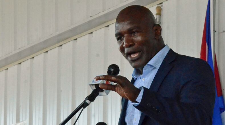 Evander Holyfield gives his speech at the International Boxing Hall of Fame's induction ceremony in Canastota, N.Y., Sunday, June 11, 2017. (Kyle Mennig/Oneida Daily Dispatch via AP)