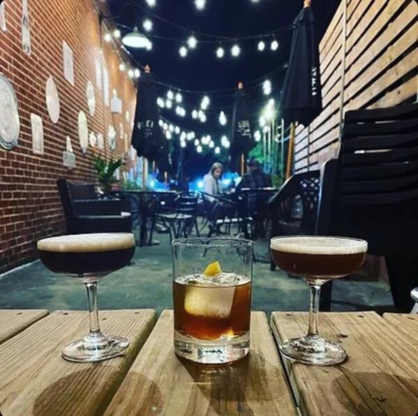 Cocktails offered by Thinking Man Tavern include (from left) a Rockaway Beach, a witchy woman and a purple rain. (Courtesy of Davy Minor)