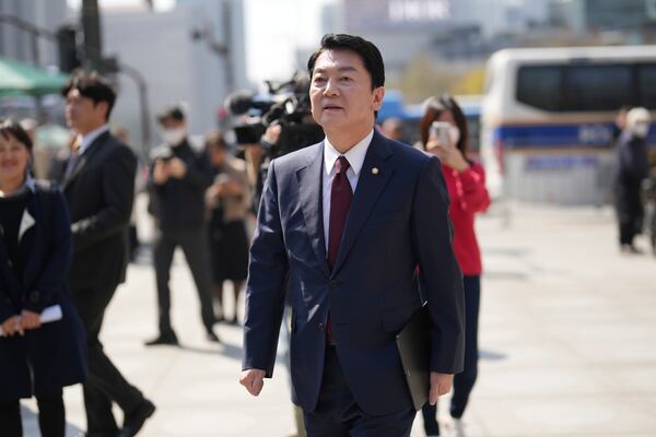 Ahn Cheol-soo, a lawmaker of the People Power Party, arrives for a press conference to announce his candidacy in the presidential election in Seoul, South Korea, Tuesday, April 8, 2025. (AP Photo/Lee Jin-man)