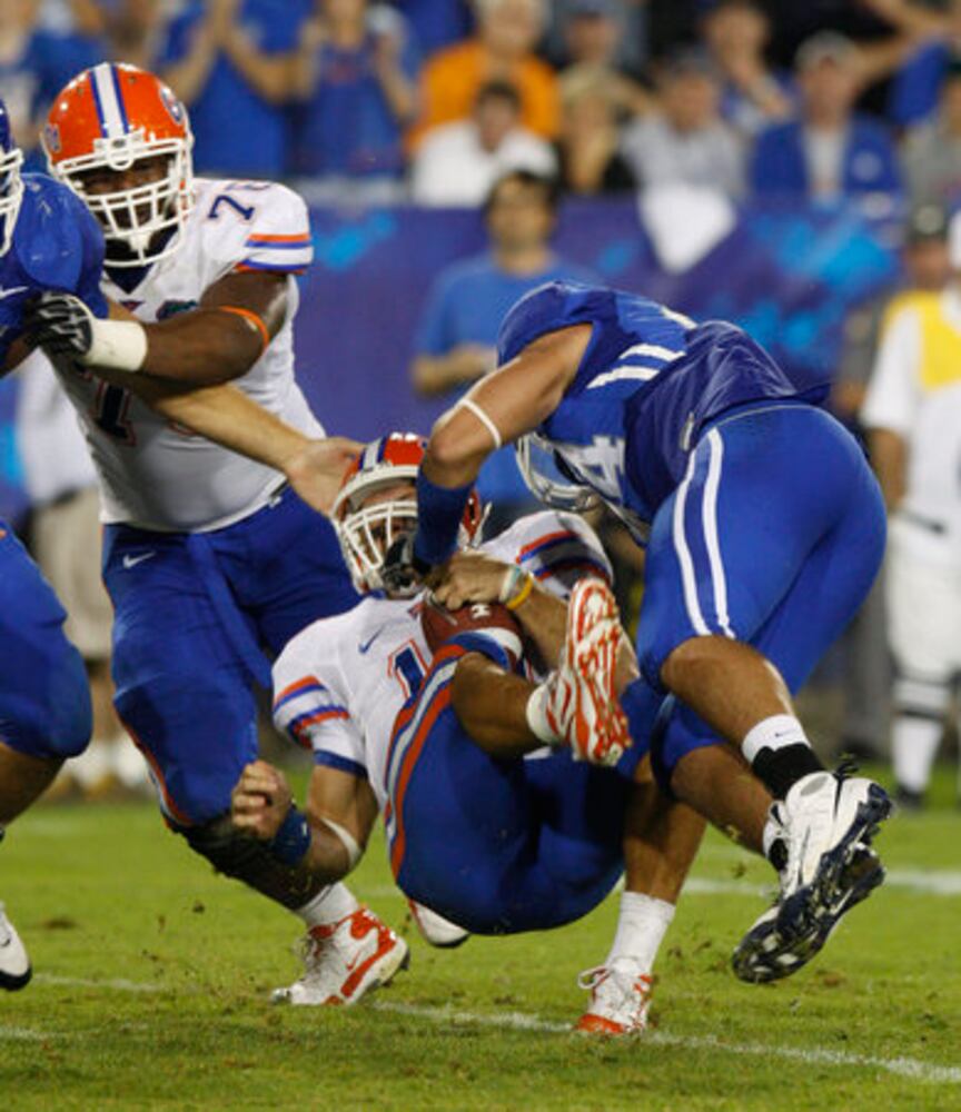 Tim Tebow photos: Gator QB knocked out at Kentucky