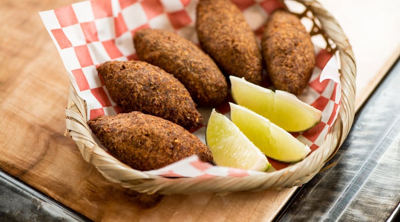 Buteco Quibe, croquettes of beef, bulgur wheat, and mint with fresh lime. Photo credit- Mia Yakel.