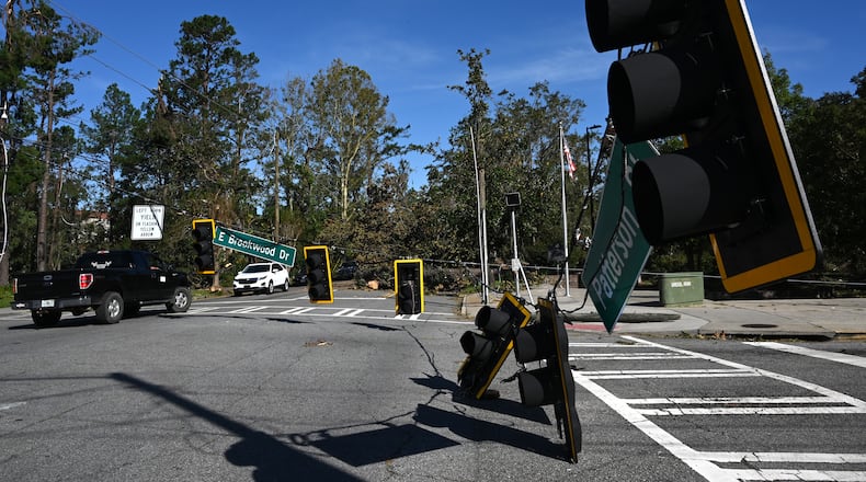 Fallen traffic signals and wires are seen in Valdosta on Saturday, Sept. 28, 2024. The devastation in Valdosta was extensive after the South Georgia city was battered with hurricane-force winds on Helene’s path across the state. Valdosta, a part of Lowndes County, is one of several dozen Georgia counties where students applying to Georgia Tech under Early Action 1 are getting an extension because of the storm damage recovery effort. (Hyosub Shin / AJC)