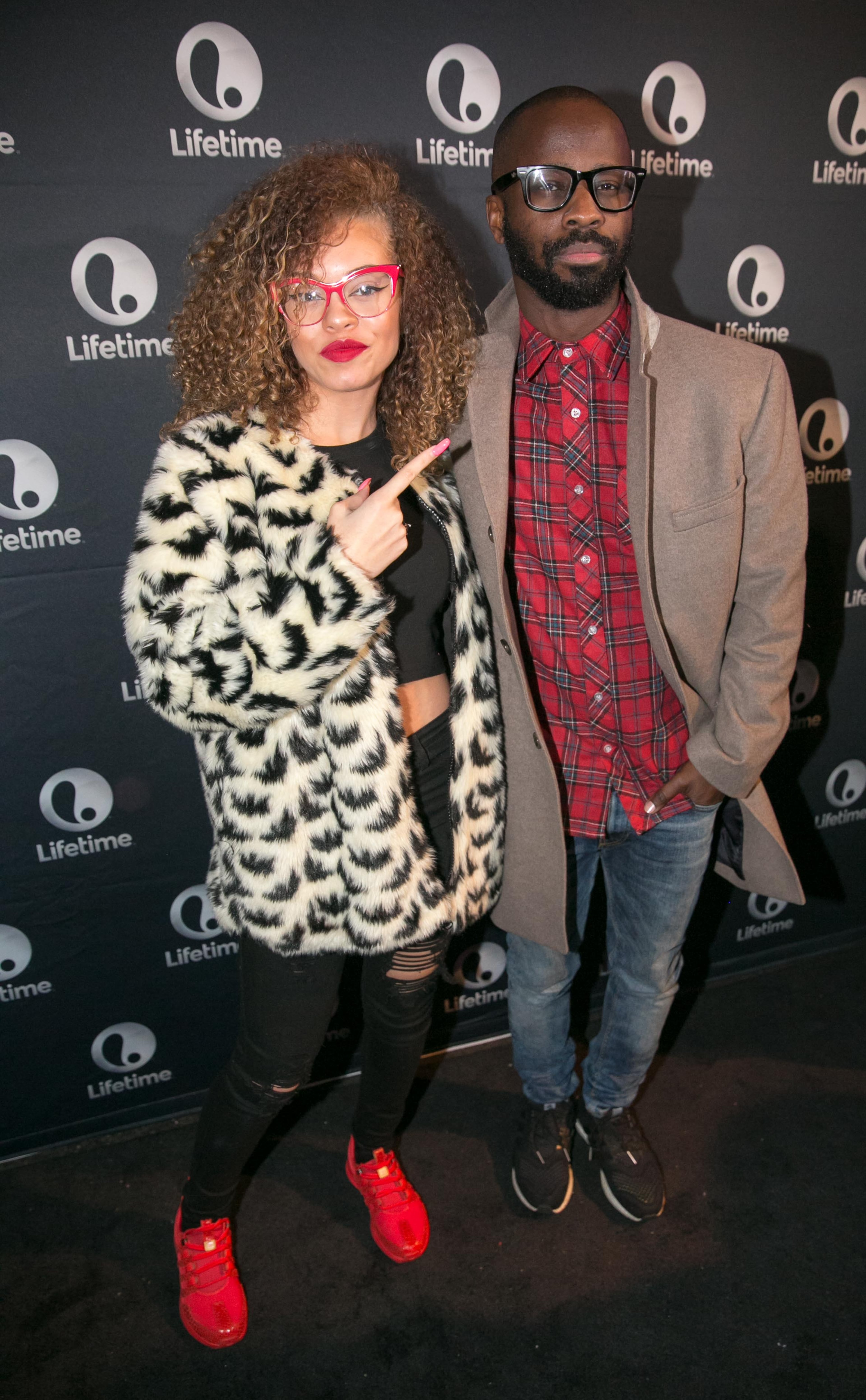 Music producer Bryan-Michael Cox, photographed in 2020 with rapper Latto, is being sued by singer Usher over a failed Buckhead restaurant project. (AJC 2020)