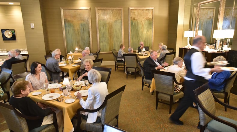 Residents at Lenbrook Senior Community in Buckhead enjoy fine-dining options but the costs for food, rent, facility fees and activities at some senior communities have become prohibitively expensive for many older residents. Residents at senior living communities nationwide have seen double digit increases in monthly costs, according to some reports. HYOSUB SHIN / HSHIN@AJC.COM