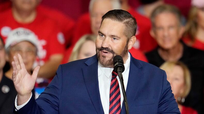 FILE - Maricopa County Recorder candidate Arizona state Rep. Justin Heap, R-Phoenix, speaks during a campaign event Oct. 22, 2024, in Peoria, Ariz. (AP Photo/Ross D. Franklin, File)
