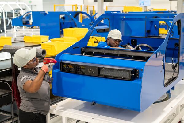 Hyundai Metaplant trainees practice vehicle assembly skills on a scale version of the factory's assembly line at the Hyundai Mobility Training Center of Georgia. (Courtesy of Georgia Quick Start)