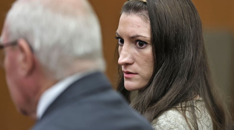 Lindsay Clancy looks to her lawyer Kevin Reddington as the jury keeps deliberating at her murder trial at Plymouth Superior Court in Plymouth, Mass., Tuesday, Sept. 1, 2026. (Greg Derr/The Patriot Ledger via AP, Pool)