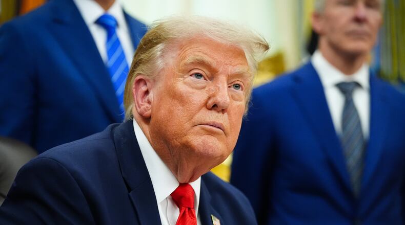 President Donald Trump speaks about Dulles International Airport modernization, in the Oval Office of the White House, Wednesday, July 29, 2026, in Washington. (AP Photo/Julia Demaree Nikhinson)