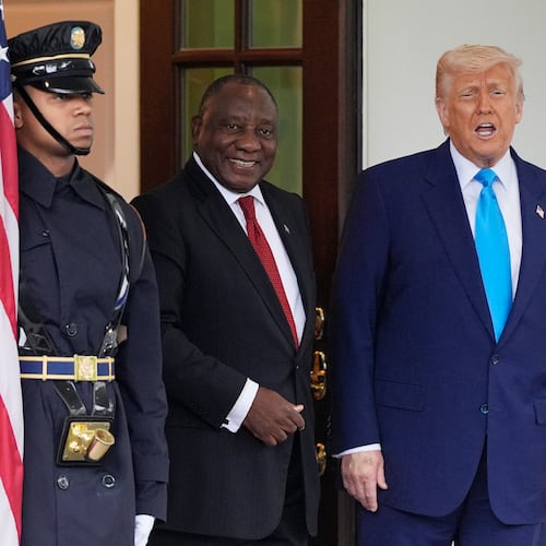 FILE - President Donald Trump greets South African President Cyril Ramaphosa, center, at the White House, May 21, 2025, in Washington. (AP Photo/Julia Demaree Nikhinson, File)