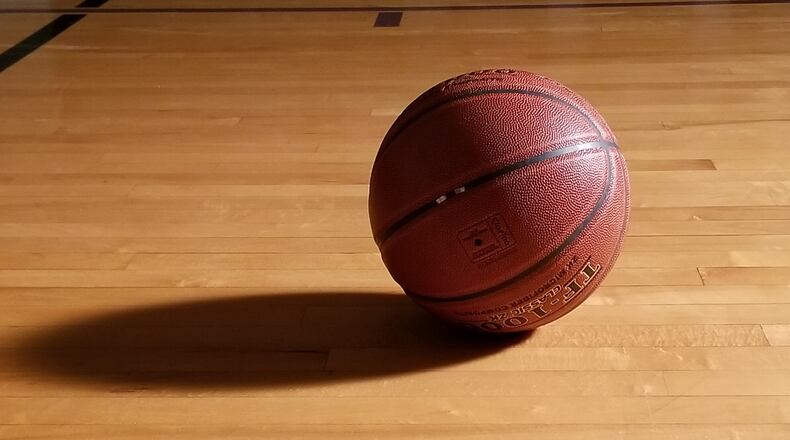 High school basketball on wood.