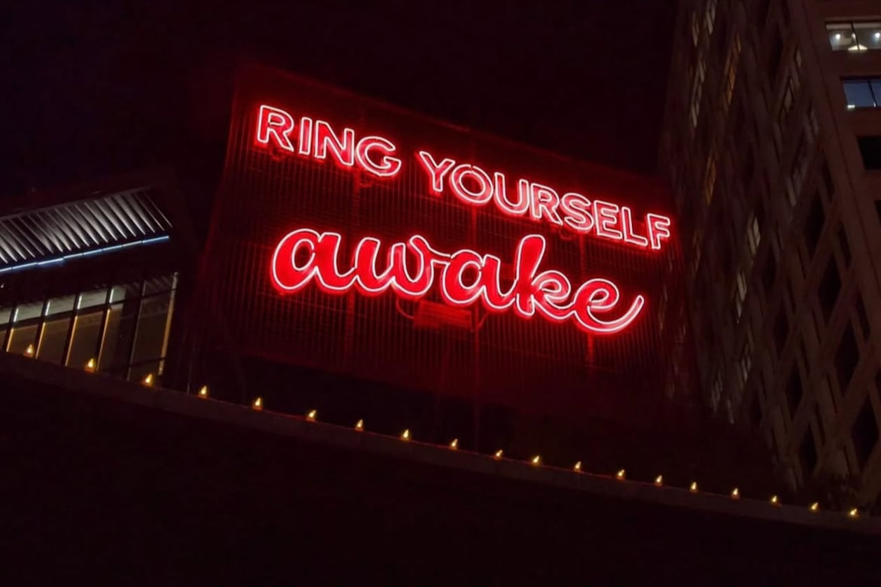 Poet Theresa Davis' words are illuminated in neon at the Goat Farm as part of the "Neon Poetry" project. (Courtesy of Theresa Davis)