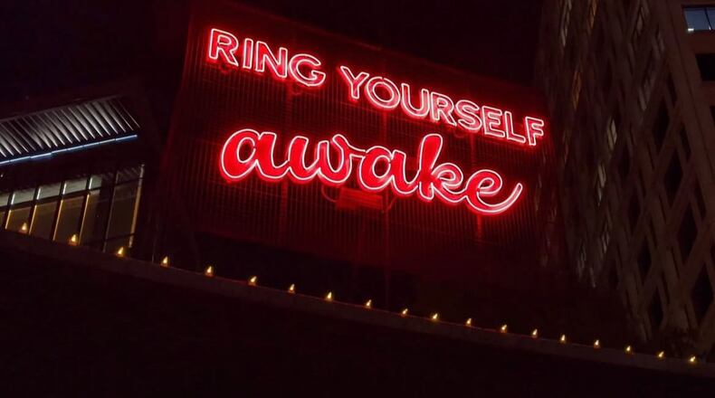 Poet Theresa Davis' words are illuminated in neon at the Goat Farm as part of the "Neon Poetry" project. (Courtesy of Theresa Davis)