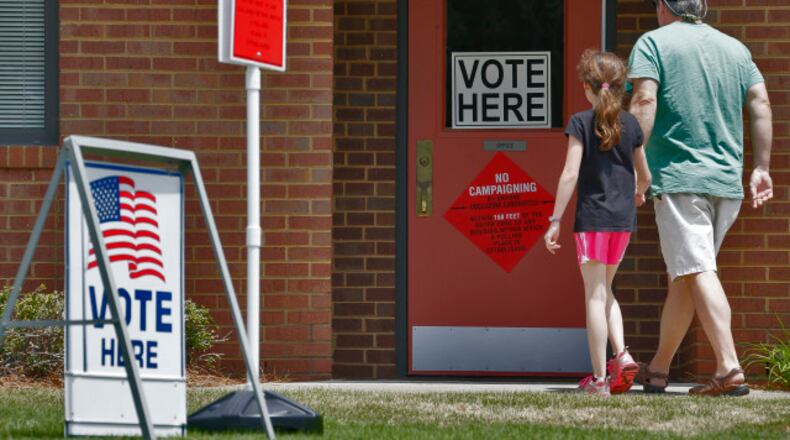 Cobb County voters in 2017, the last time the E-SPLOST there was renewed. AJC file photo