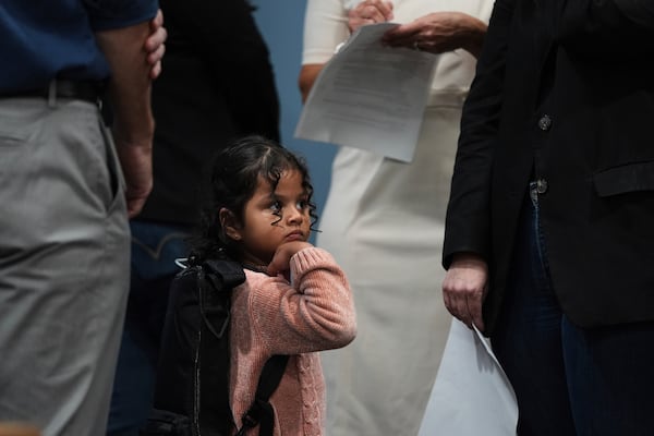 A 4-year-old girl with short bowel syndrome arrives with her mother at a news conference in Los Angeles, Wednesday, May 28, 2025, after their humanitarian parole was terminated and they were ordered to self-deport. (AP Photo/Jae C. Hong)