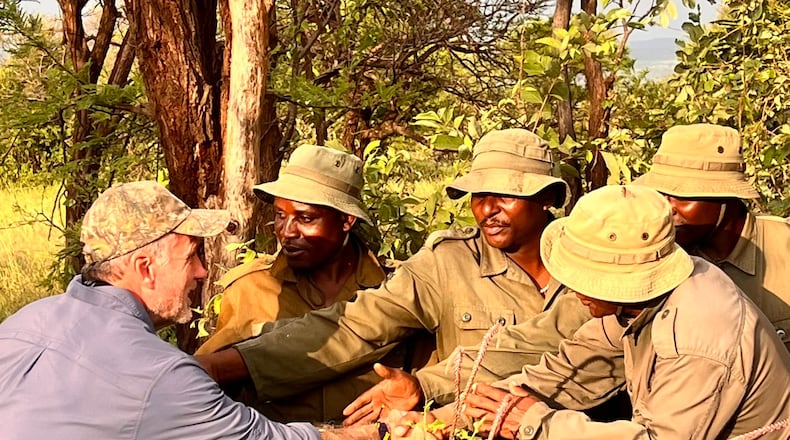 U.S. Rep. Buddy Carter meets with anti-poaching patrol agents in the Serengeti.
