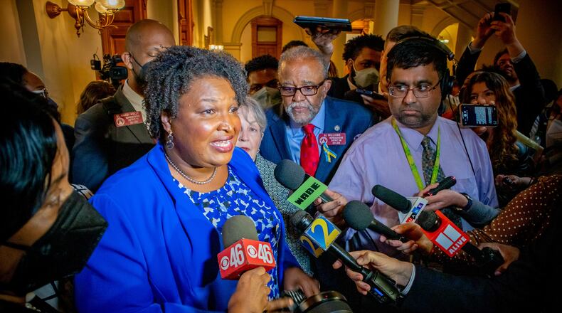Stacey Abrams talks with the press at the State Capitol after qualifying to run for office on the second day of qualifying Tuesday, March 8, 2022, at the Georgia State Capitol.  STEVE SCHAEFER FOR THE ATLANTA JOURNAL-CONSTITUTION