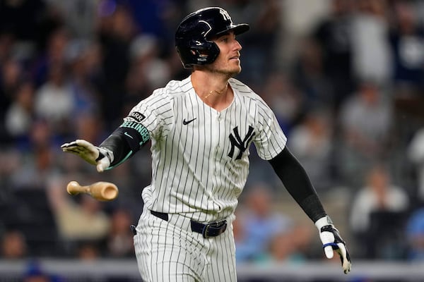 New York Yankees' Cody Bellinger (35) hits a home run during the eighth inning of a baseball game against the Chicago Cubs, Friday, July 11, 2025, in New York. (AP Photo/Yuki Iwamura)