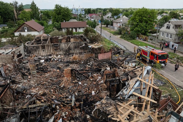 Residential houses are seen destroyed after a Russian drone strike in Pryluky village, Ukraine, Thursday, June 5, 2025. (AP Photo/Evgeniy Maloletka)