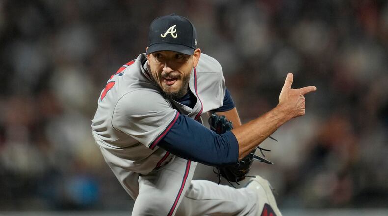 Atlanta Braves pitcher Charlie Morton follows through on a pitch that struck out San Francisco Giants' Mike Yastrzemski during the sixth inning of a baseball game in San Francisco, Tuesday, Aug. 13, 2024. (AP Photo/Jeff Chiu)