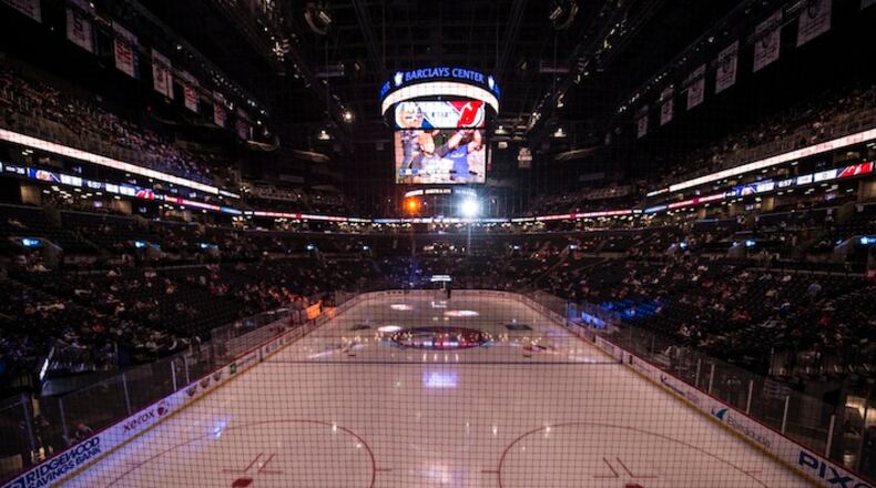 FILE — The Barclays Center hosts a preseason game between the New Jersey Devils and the New York Islanders, who moved here in the offseason, in Brooklyn, Sept. 23, 2015. There are high expectations for the Islanders to win their first playoff series in 22 years. (Ben Solomon/The New York Times)
