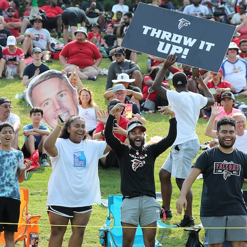 Atlanta Falcons fans cheer their team at training camp practice on Saturday, July 31, 2021, in Flowery Branch. (Curtis Compton/AJC)