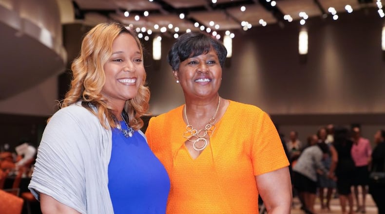 Melissa Waller (left), pictured here with Sharmen Gowens, CEO of the YWCA of Greater Atlanta, shared her story of domestic violence at the YWCA s 35th annual Salute to Women of Achievement in April. CONTRIBUTED BY CASEY MCDANIEL WRIGHT